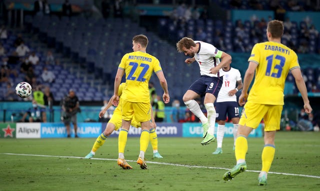 Harry Kane heads in number three 