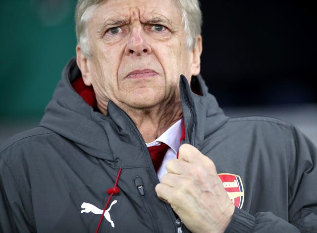 Arsenal manager Arsene Wenger and his side battled the elements