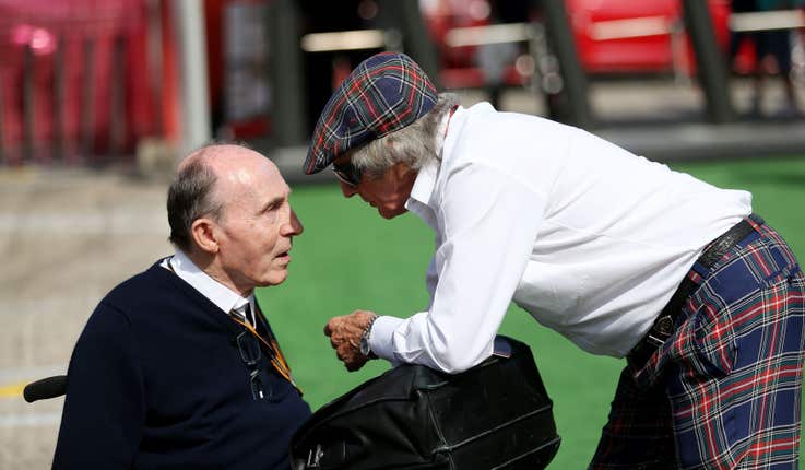 Sir Jackie Stewart (right) chats with Sir Frank Williams during the Spanish Grand Prix