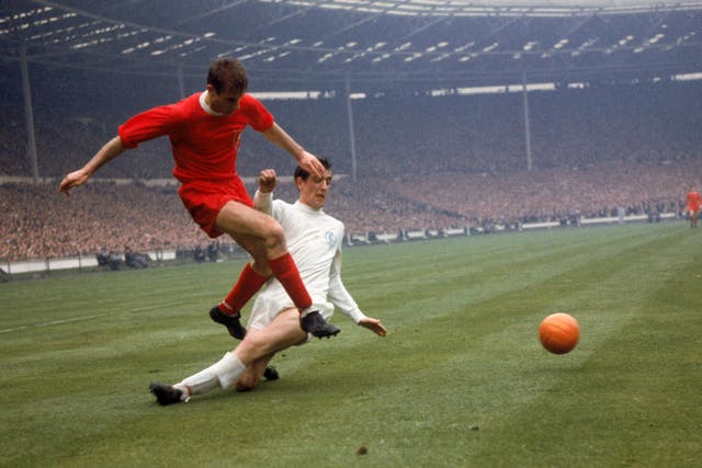 Hunter, right, challenges Liverpool forward Roger Hunt during the 1965 FA Cup final at Wembley