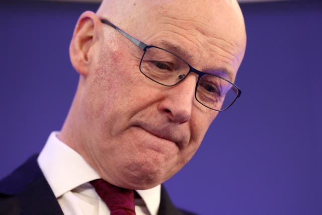 Headshot of John Swinney looking concerned