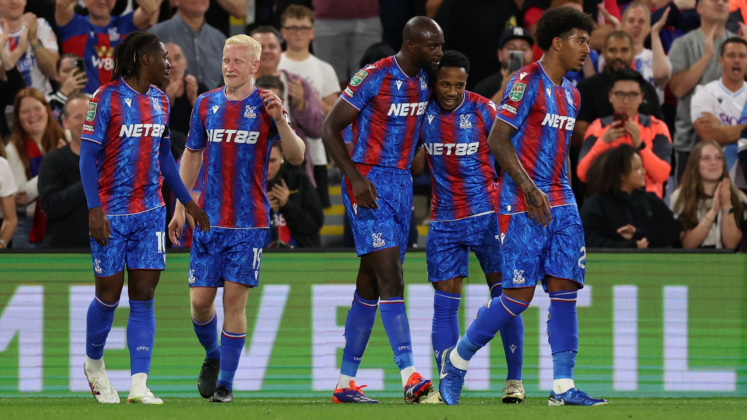Jean-Philippe Mateta, centre, celebrates with team-mates after scoring Crystal Palace’s second goal against Norwich (Steven Paston/PA)