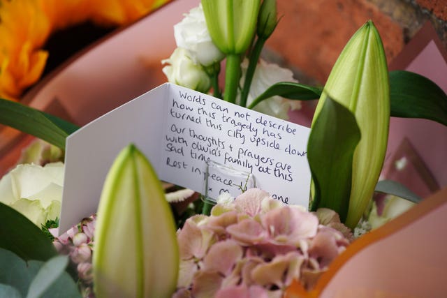 Flowers left near the scene in Kingsheath Avenue, Knotty Ash