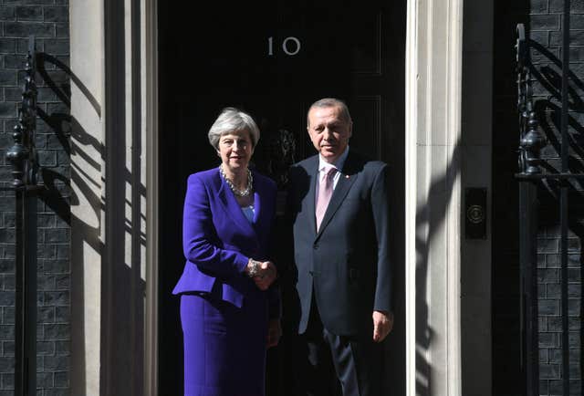 Theresa May greets Turkish president Recep Tayyip Erdogan at 10 Downing Street (Victoria Jones/PA)