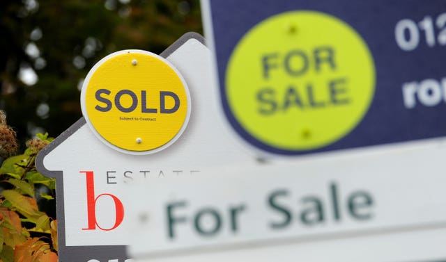 File photo dated 14/10/14 of estate agent signs (Andrew Matthews/PA)