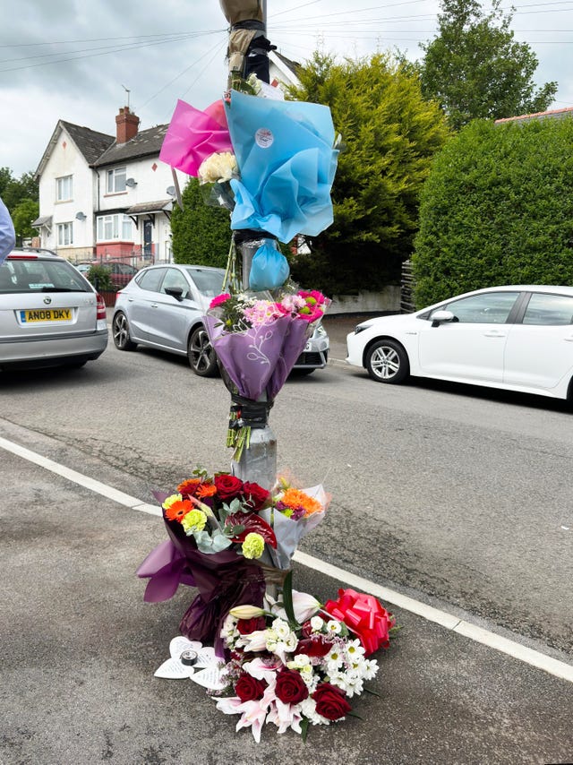 Flowers and tributes left for the two teenagers in Ely, Cardiff, whose death in a car crash sparked a riot