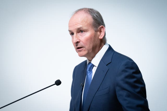 Micheal Martin speaking into a microphone