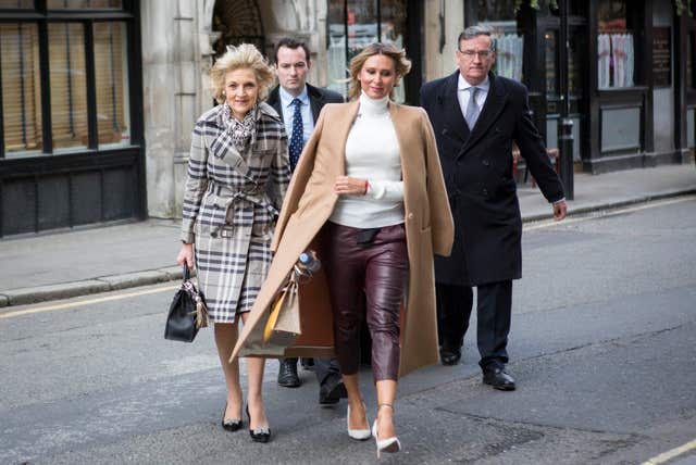 Tatiana Akhmedova, centre, arrives at the Royal Court of Justice with her lawyer Baroness Shackleton of Belgravia, left (Rick Findler/PA)