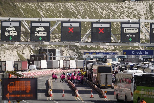 Coaches wait to enter the Port of Dover on Sunday (Andrew Matthews/PA)