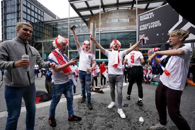 England fans outside Wembley Stadium ahead of the UEFA Euro 2020 semi-final match between England and Denmark 