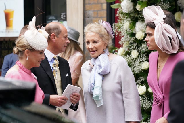 The Earl and Countess of Wessex talk to Princess Michael of Kent, centre, following the wedding of Flora Ogilvy