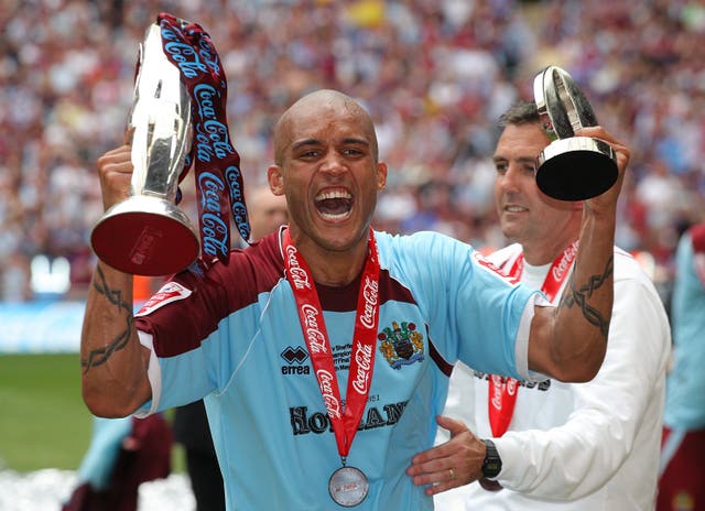 Clarke Carlisle helped Burnley reach the Premier League during his playing days