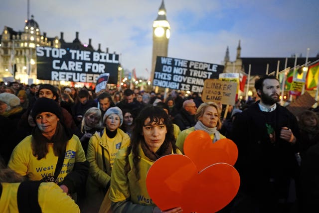 Demonstrators protesting against the Illegal Migration Bill in Parliament Square, London, during the second reading of the the bill in the House of Commons on Monday March 13, 2023