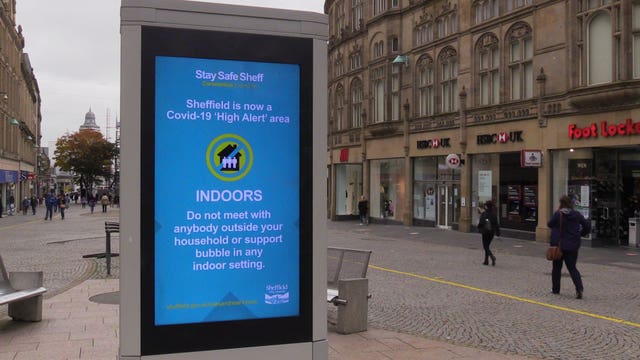 A coronavirus advice sign in Sheffield city centre