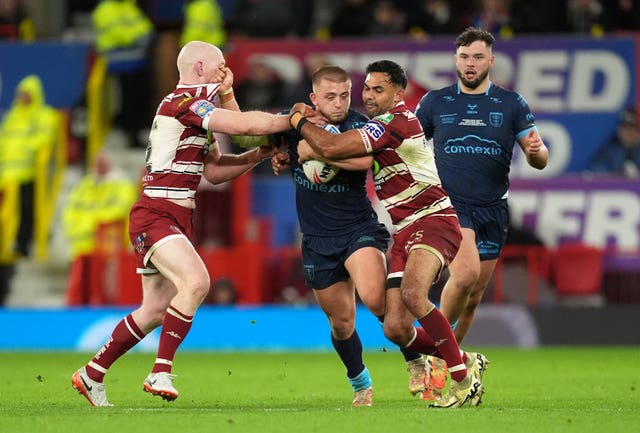 Liam Farrell and Bevan French tackle Mikey Lewis