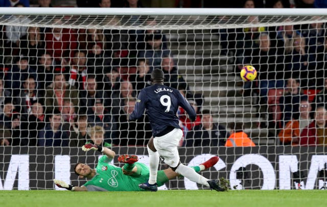 Manchester United's Romelu Lukaku (right) scores a goal. (PA)