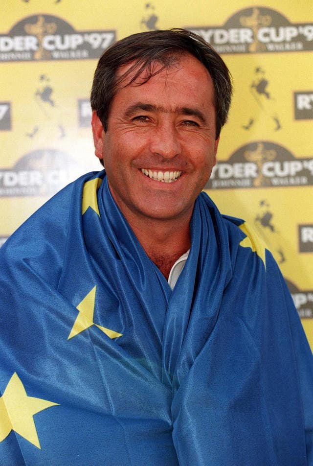 Ryder Cup captain Seve Ballesteros wraps himself with a European flag after winning the Ryder Cup at Valderrama, Spain.