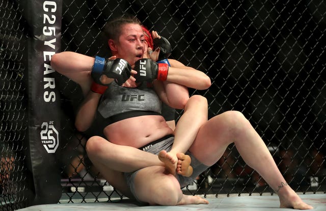Molly McCann, left, lost on her UFC debut but has rebounded with three successive wins (Martin Rickett/PA)