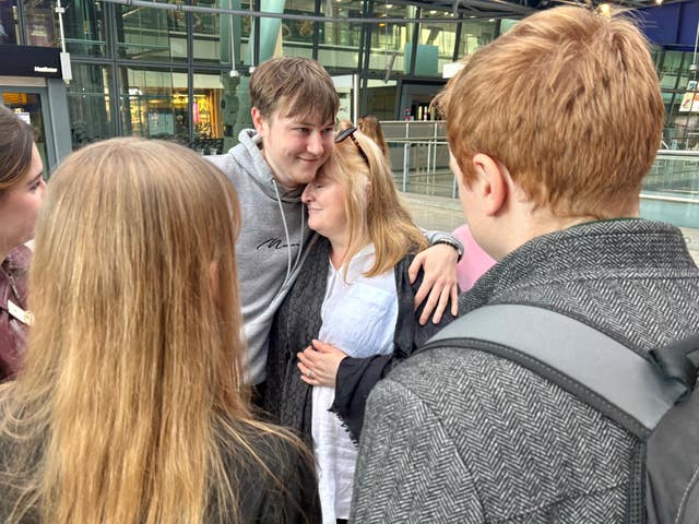 Sarah Short with her family at Heathrow