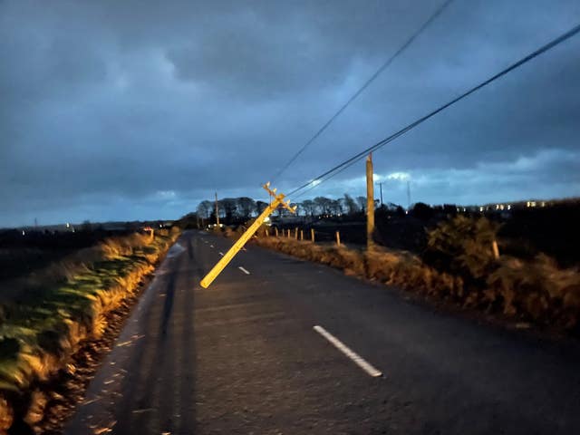 A broken telegraph pole in the road in Co Antrim