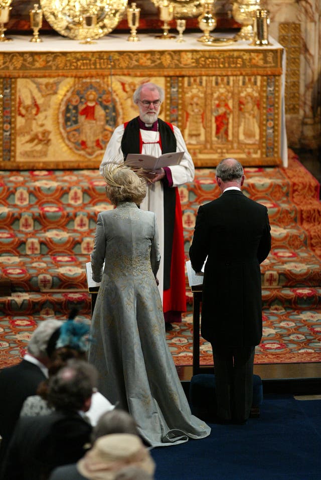 The Prince Of Wales and the Duchess of Cornwall stand in front of Dr Rowan Williams, the Archbishop of Canterbury during their marriage blessing (Chris Ison/PA)