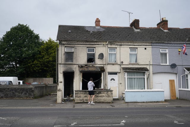 A burnt out house on Queen Street following a second night of violence in Ballymena last week 