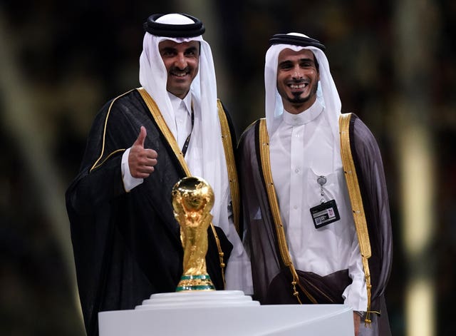 Emir of Qatar Sheikh Tamim bin Hamad al-Thani (left) and Sheikh Jassim bin Hamad al-Thani following the FIFA World Cup Final match at the Lusail Stadium in Lusail, Qata