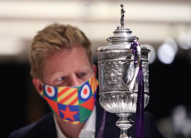 James Flower of Bonhams with the oldest surviving FA Cup trophy 