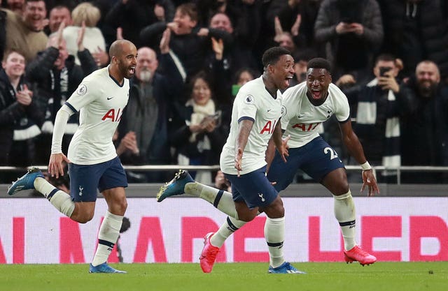 Steven Bergwijn (centre) celebrates scoring on his debut for Tottenham in a 2-0 win against Premier League champions Manchester City 