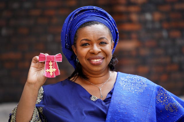 Felicia Kwaku with her OBE medal for services to nursing 