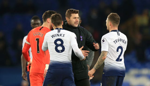 Tottenham manager Mauricio Pochettino embraces Kieran Trippier 
