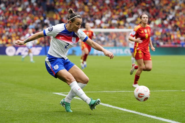 Lucy Bronze kicking a ball