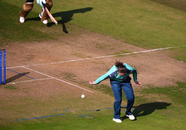 Amanda-Jade Wellington with a no-look underarm throw to run out Emma Lamb