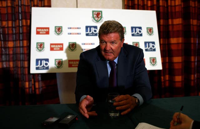 John Toshack's departure was announced at a press conference in Cardiff