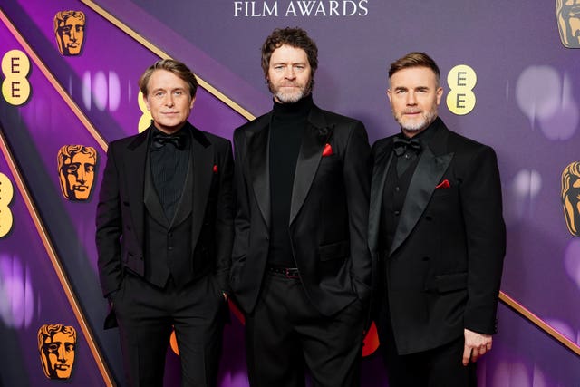 Gary Barlow, Howard Donald and Mark Owen of Take That attending the 78th British Academy Film Awards, at the Royal Festival Hall, Southbank Centre, London