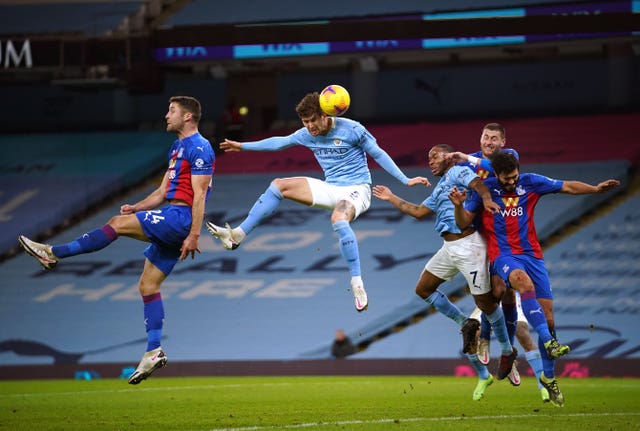 John Stones' header opens the scoring against Crystal Palace
