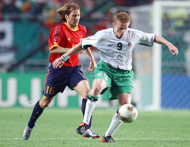 Gaizka Mendieta (left) scored the decisive penalty as Spain beat the Republic in 2002