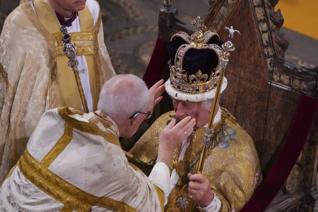 The King is crowned with St Edward’s Crown by The Archbishop of Canterbury the Most Reverend Justin Welby 