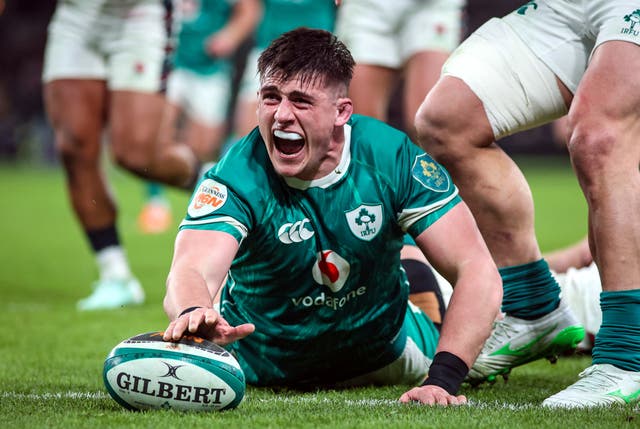 Ireland hooker Dan Sheehan celebrates scoring a try