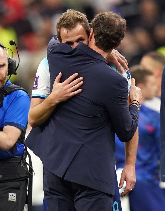 Harry Kane is consoled by manager Gareth Southgate 