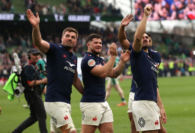 France's players wave at the crowd