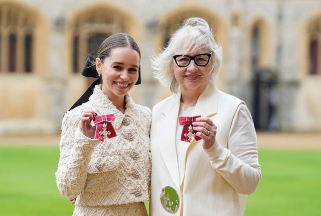 Emilia Clarke and her mother Jenny after being made MBEs