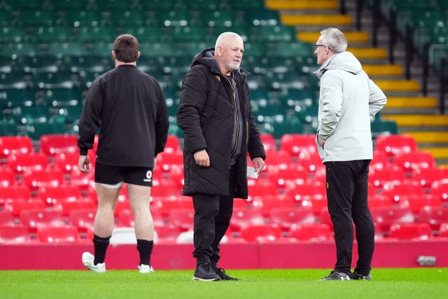 Wales head coach Warren Gatland (centre) and assistant coach Rob Howley (right) during a training session at the Principality Stadium on January 27