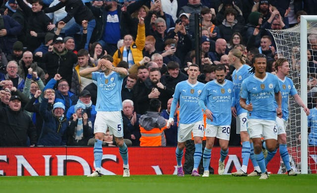 Manchester City’s John Stones (left) celebrates the opening goal (Peter Byrne/PA)