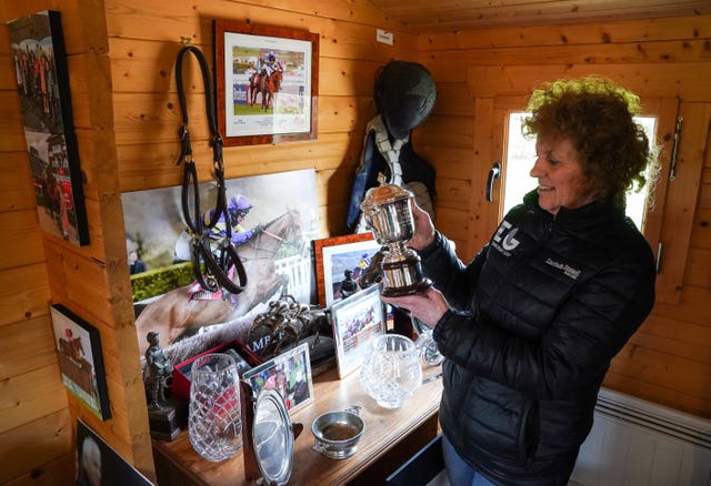 Lucinda Russell holding the Ultima trophy, which Corach Rambler won for a second time last month