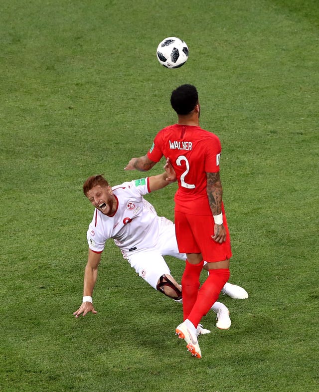 Kyle Walker, right, tangles with Fakhreddine Ben Youssef