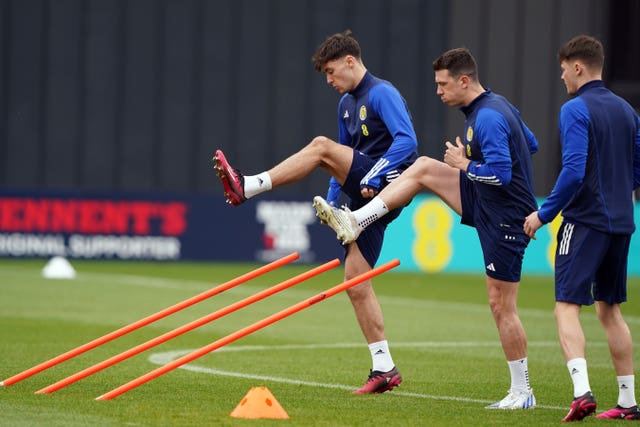 Scotland’s Aaron Hickey, Ryan Jack and Nathan Patterson during a training session at Lesser Hampden