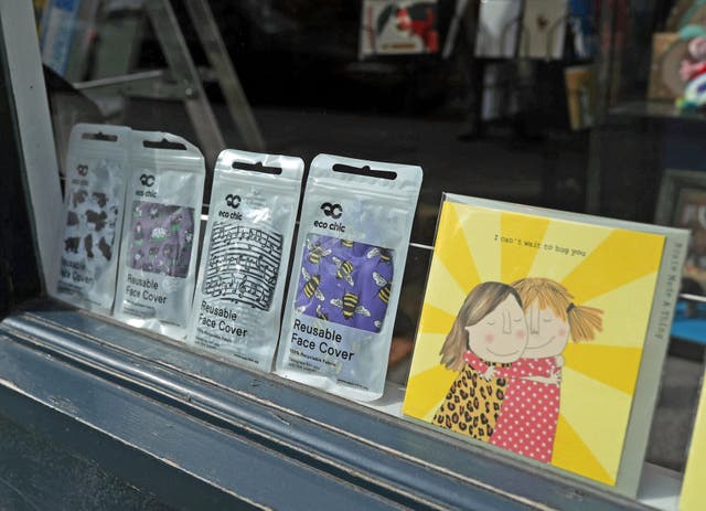 A greeting card shop displaying reusable face covers in the window, on Upper Street in Islington, north London, some six months on from the evening of March 23 when Prime Minister Boris Johnson announced nationwide restrictions 