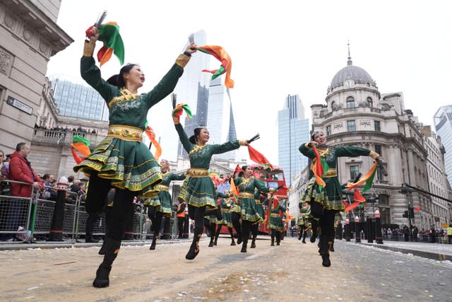 Performers take part in the Lord Mayor’s Show in the City of London