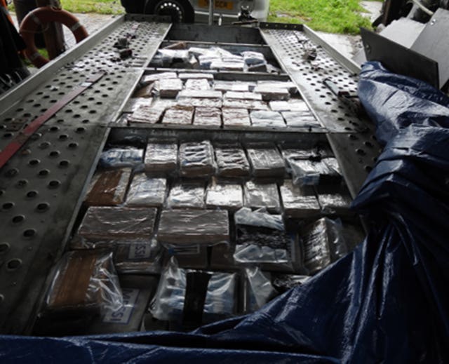 Drugs smuggled into the UK in a trailer which had been converted to include a hide so drugs could be stored in it 